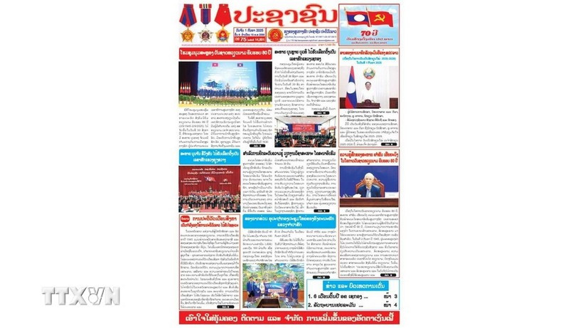 The article by Khamphan Pheuyavong, head of the Lao People’s Revolutionary Party (LPRP) Central Committee’s Propaganda and Training Commission and Chairman of the LPRP Central Committee's Theory Council, published in the Pasaxon newspaper (Photo: VNA)