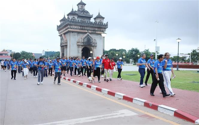 People attend the event. (Photo: VNA)