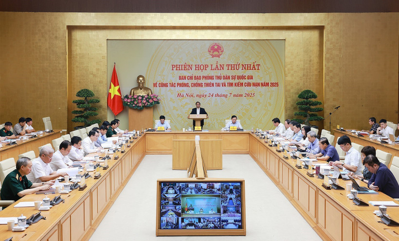 Prime Minister Pham Minh Chinh, who is also Head of the National Civil Defence Steering Committee, chairs the committee’s first national meeting on disaster prevention and control, and search and rescue efforts on July 24. (Photo: VNA)