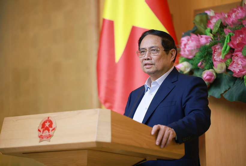 Prime Minister Pham Minh Chinh speaks at the 6th meeting of the Central Steering Committee for Elimination of Temporary and Dilapidated Houses across the nation on July 9 in Hannoi. (Photo: VNA)
