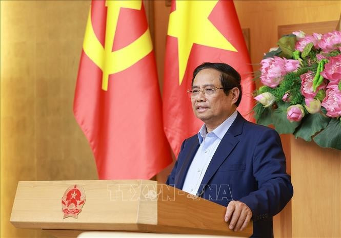 Prime Minister Pham Minh Chinh addresses the working session (Photo: VNA)