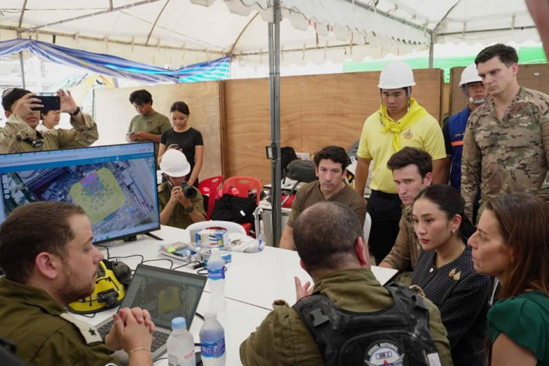 Prime Minister Paetongtarn Shinawatra listens to a briefing by a team of Israeli rescuers who are part of an international contingent working at the collapsed building site in Bangkok. (Photo: Bangkok Post)