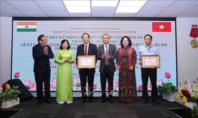 Two collectives and six individuals from the VIFA are presented certificates of merit from the Chairperson of the HCM City People's Committee for their outstanding achievements in people-to-people diplomacy. (Photo: VNA)