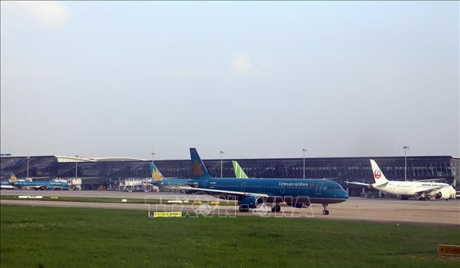 At Noi Bai international airport (Photo: VNA)