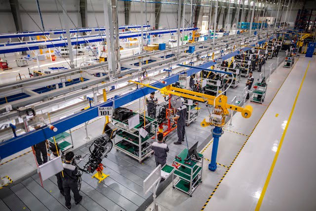Workers assemble parts on an automotive production line in HCM City. The city’s industrial sector is showing strong signs of recovery. (Photo: moit.gov.vn)