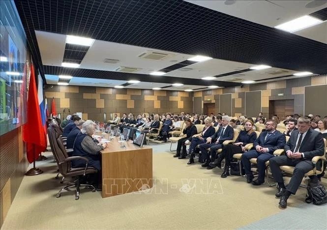 Participants at the meeting (Photo: VNA)