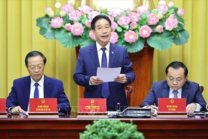 Deputy Head of the Office of the President Pham Thanh Ha chairs the press conference. (Photo: VNA)