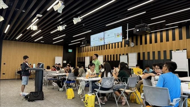 Children attend the event at Singapore-based Google office. (Photo: VNA)