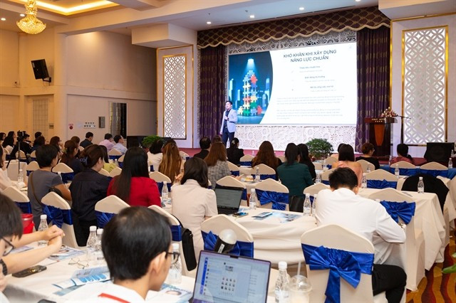 Le Thanh Lam, CEO of TOPSKILLS, shares insights into the role of AI in modern HR management at the launch event of the AI-Powered TMS system in HCM City on May 16. (Photo: courtesy of the organisers)