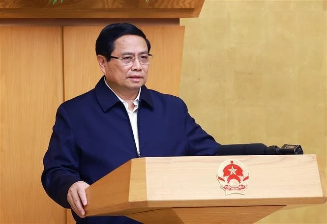 Prime Minister Pham Minh Chinh addresses the session on January 7. (Photo: VNA)