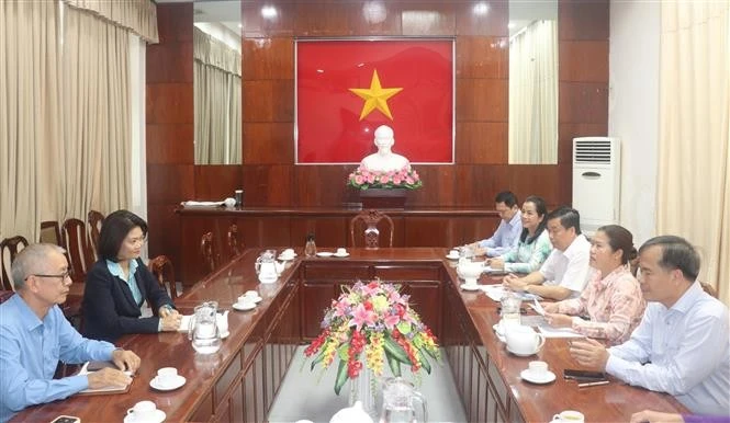 Representatives from ActionAid Vietnam and Can Tho City People's Committee at the working session to discuss orientations for the organisation's programmes and projects after the merger of Can Tho, Soc Trang, and Hau Giang. (Photo: VNA) 