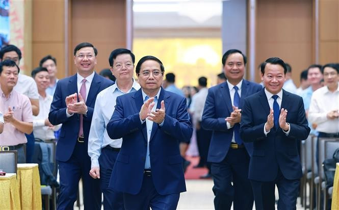 Prime Minister Pham Minh Chinh (centre) at the conference (Photo: VNA)