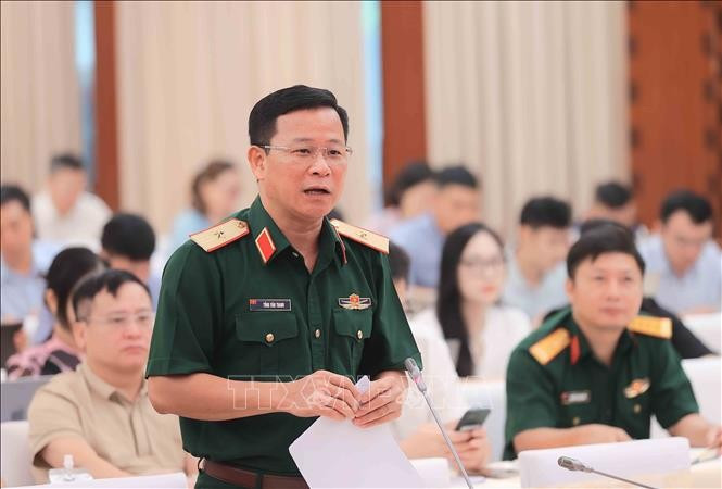 Major General Tong Van Thanh, Deputy Director of the Department of Information and Training under the General Department of Politics of the Vietnam People's Army addresses at the press conference. (Photo: VNA)