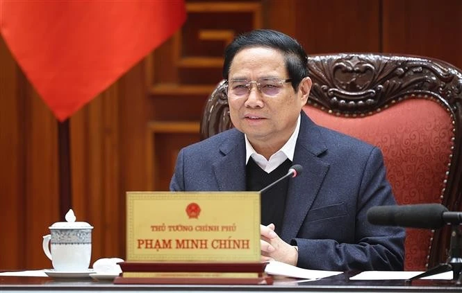 Prime Minister Pham Minh Chinh addresses the meeting (Photo: VNA)