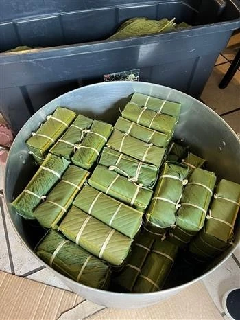 Banh Chung is the iconic square sticky rice cake that symbolises Tet (Photo: VNA)