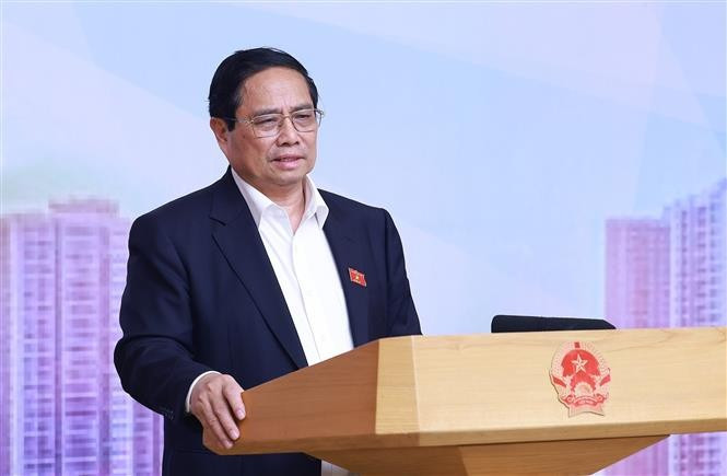PM Pham Minh Chinh speaks at the meeting. (Photo: VNA)