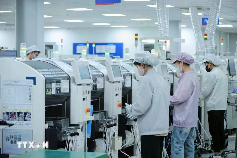 Many FDI enterprises have invested big in advanced and modern machinery systems for production. (Photo: VNA) 