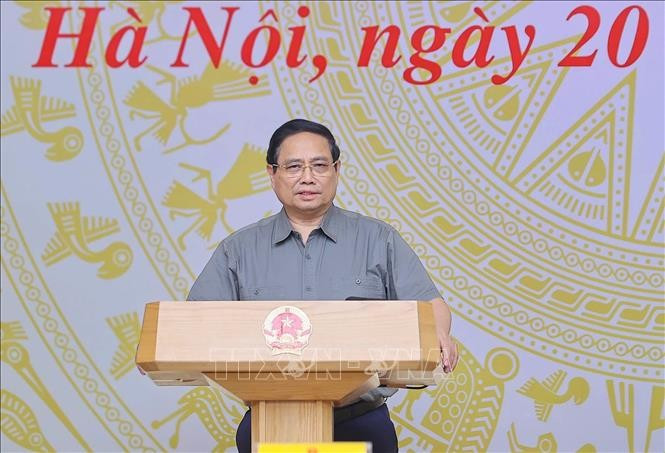 Prime Minister Pham Minh Chinh addresses the meeting (Photo: VNA)