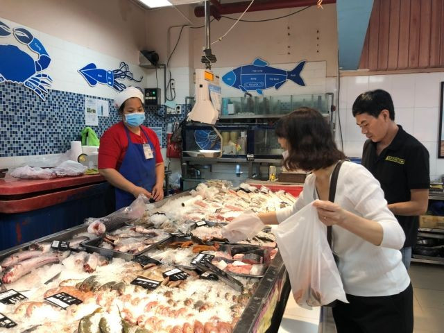 A woman goes to the supermarket in HCM City. (Photo: VNA)