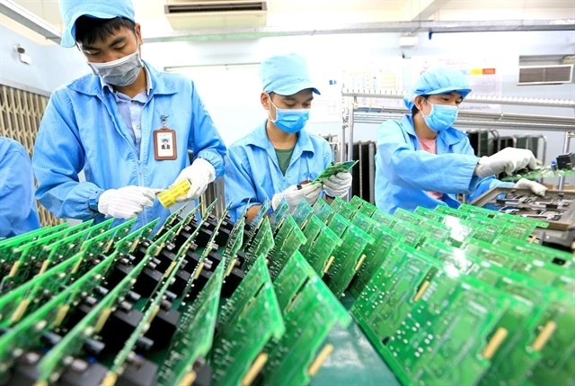 Electronic meter production line in Central Power Corporation's Electronic Measurement Equipment Manufacturing Center (EVNCPC EMEC). (Photo: VNA)