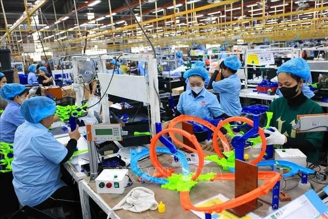 Manufacturing toys for export at Bilion Max Vietnam Export Processing Co. Ltd. in Hue city. (Photo: VNA) 