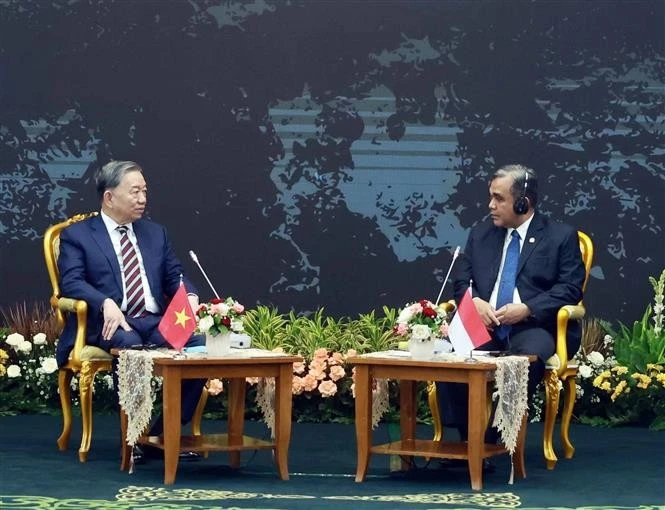 General Secretary of the Communist Party of Vietnam (CPV) Central Committee To Lam (left) and Speaker of the People's Consultative Assembly (MPR) of Indonesia Ahmad Muzani in Jakarta on March 11. (Photo: VNA)