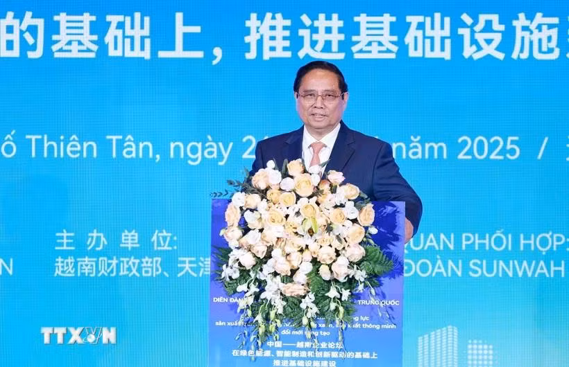 Prime Minister Pham Minh Chinh addresses the Vietnam-China business forum. (Photo: VNA)