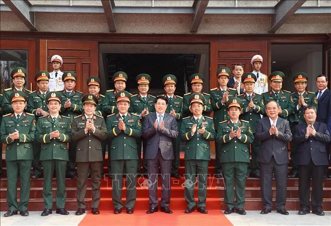 State President Luong Cuong (front, centre) and officers of the Special Operation Arms in a group photo on January 20. (Photo: VNA)