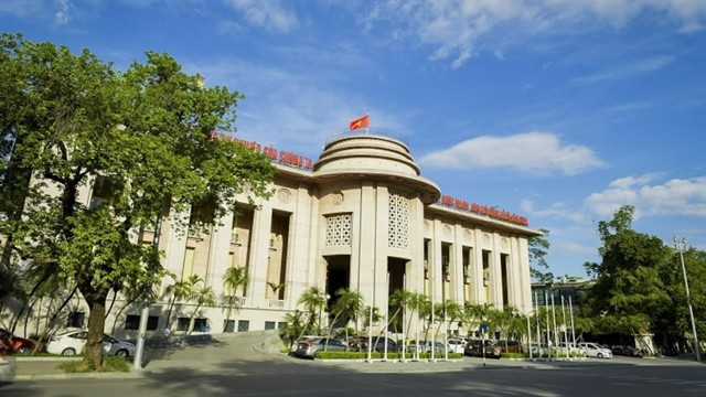 The State Bank of Vietnam's headquarters in Hanoi. The central bank has issued new regulations on opening indirect investment accounts. (Photo nhandan.vn)