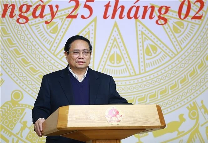 Prime Minister Pham Minh chairs the first meeting of the Steering Committee for Wastefulness Prevention and Control held in Hanoi on February 25. (Photo: VNA)