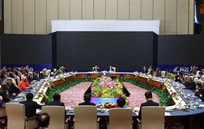 At a high-level discussion of the P4G Summit (Photo: VNA)