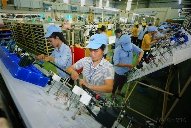 Production of electrical and electronic components at Minda Vietnam Auto Components Co., Ltd., an Indian-invested firm in Phu Tho province. (Photo: VNA)