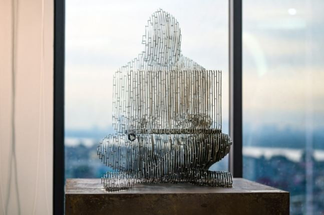 Satoshi Nakamoto's statue Blockchain Gallery in Hanoi (Photo: VNA)