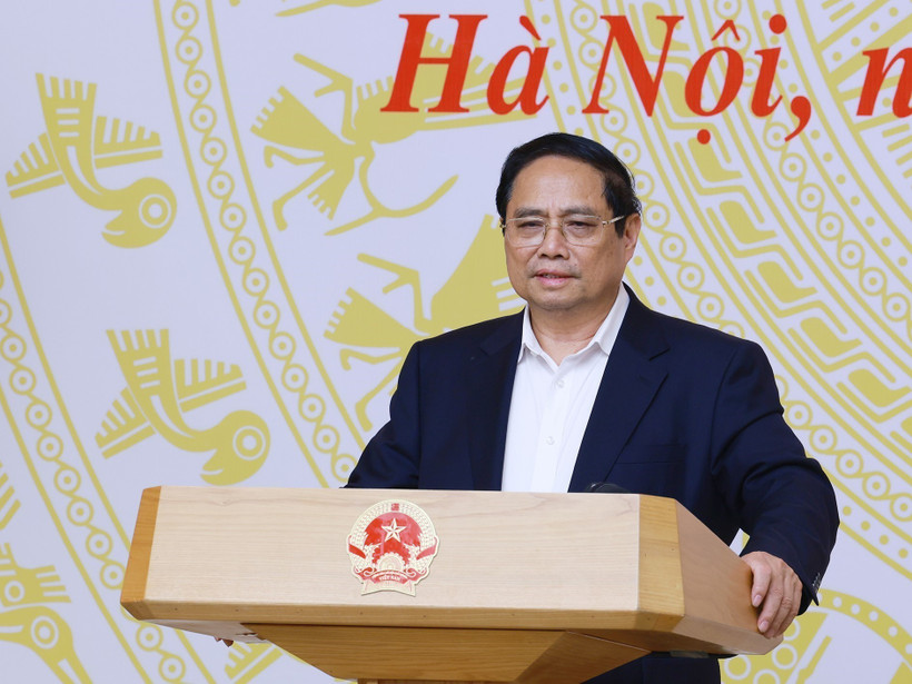 Prime Minister Pham Minh Chinh speaks at the national conference on the organisation of the high school graduation examination on June 18. (Photo: VNA)