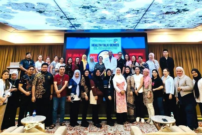 At the launch of the women's healthcare programme. (Photo: VNA)