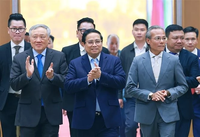 Prime Minister Pham Minh Chinh (middel, front) arriving at the conference (Photo: VNA)