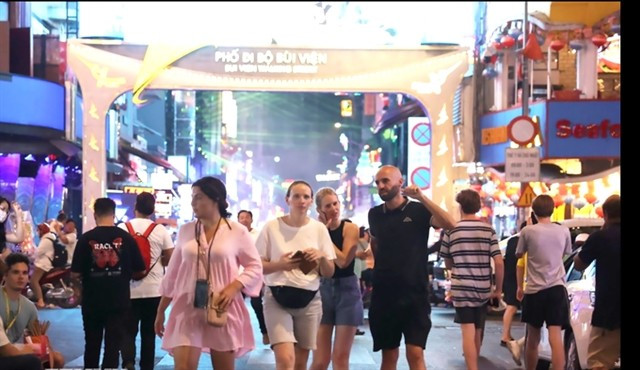 Bui Vien Walking Street in HCM City is a popular nighttime destination for international visitors. (Photo: VNA)