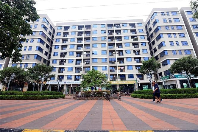 After two years of implementing the scheme to develop at least 1 million social housing units for low-income earners and industrial park workers, the country has earmarked 1,309 sites covering 9,737 hectares for such projects. (Photo: VNA)