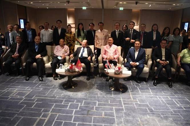 Delegates pose for a group photo at the event (Photo: VNA)