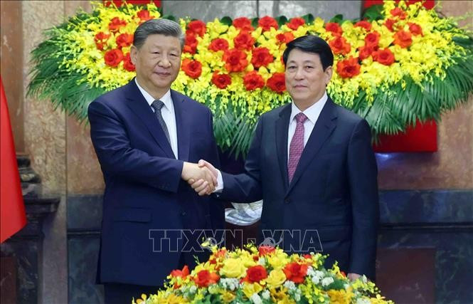 State President Luong Cuong (R) and General Secretary of the Communist Party of China (CPC) Central Committee and President of China Xi Jinping. (Photo: VNA)