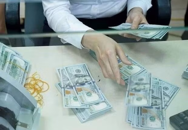 The reference exchange rate is kept unchanged on July 22. (Photo: VNA)