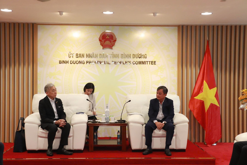 At the working session (Photo: VNA)