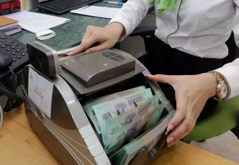 Under a 2025 outlook report released recently, experts from Vietcombank Securities Company (VCBS) predict the US dollar index (DXY) may remain at a high level and may last longer than expected.(Photo: VNA)