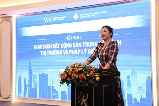 Ho Thi Quyen, deputy director of the HCM City Investment and Trade Promotion Centre, speaks at a conference titled ‘Real Estate Transactions in a Volatile Market and Legal Context’ in HCM City on August 28. Photo courtesy of ITPC)