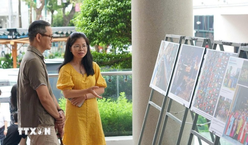 Visitors at the exhibition (Photo published by VNA)