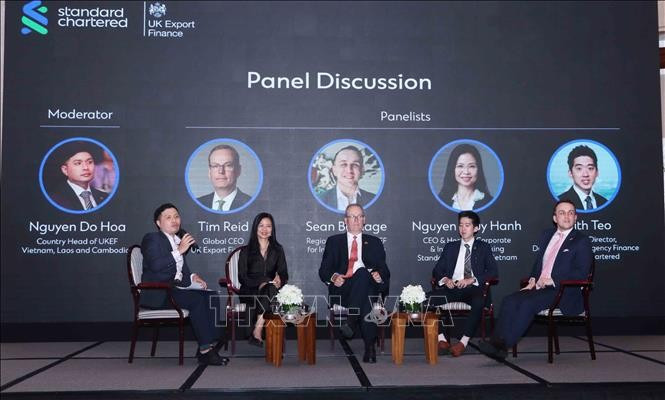 A panel discussion at the event (Photo: VNA)