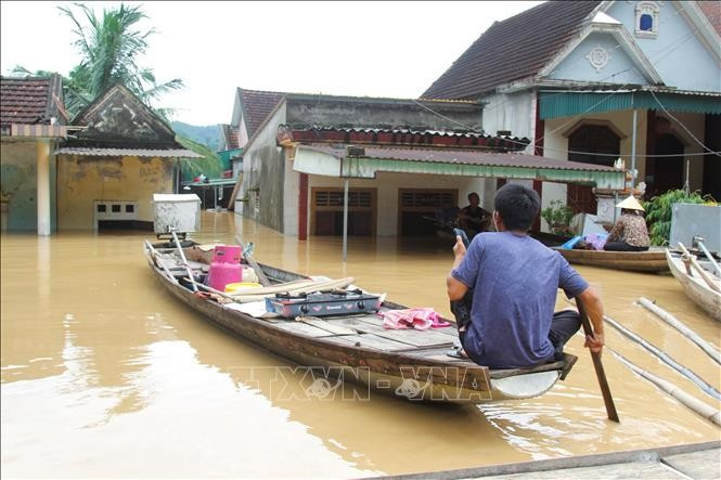 Nghe An suffers severe damage following late-July floods. In the photo: Homes and belongings of residents in Vinh Hoan village, Con Cuong commune, submerged in floodwater. (Photo: VNA)