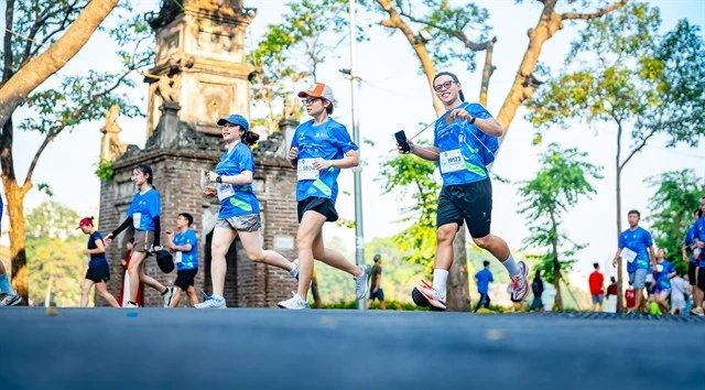 Runners compete in the Standard Chartered Hanoi Heritage Marathon 2024 (Photo: organising board)