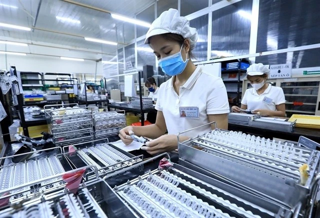 A Japan invested firm in Vietnam. To meet the 2025 growth target, the Government has called for the simplification of administrative procedures and business regulations. (Photo: VNA)