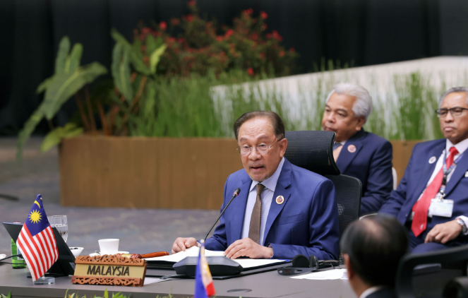 Malaysian PM Anwar Ibrahim delivers a speech at the 46th ASEAN Summit in Kuala Lumpur, Malaysia, on May 26, 2025. (Photo: Kyodo) 